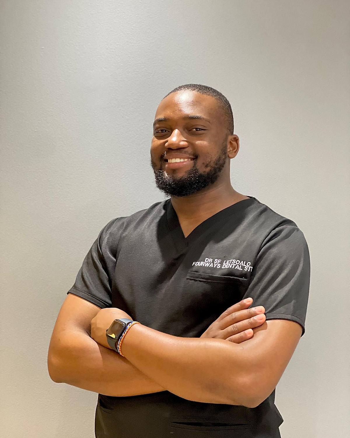 Dentist caring for a patient during treatment